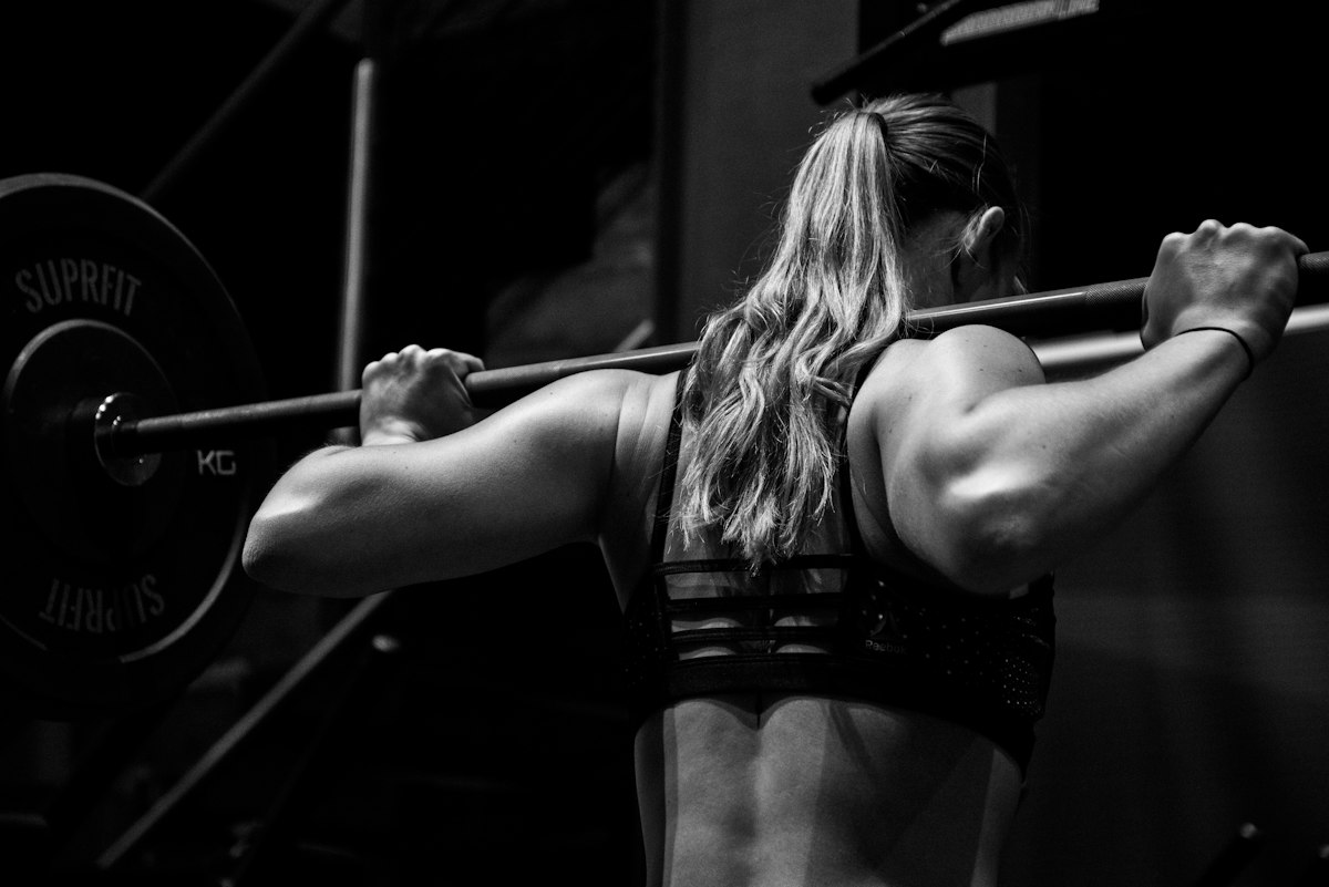 Athlete performing a barbell squat